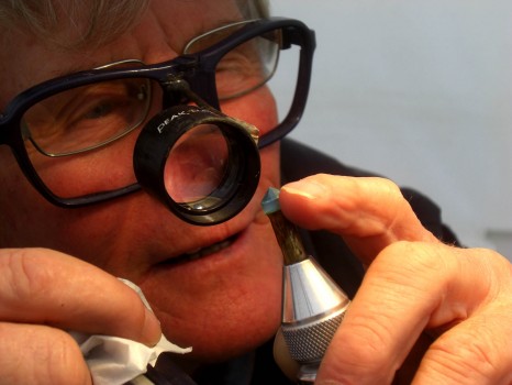 Central Otago District Arts Trust - Denis Litchfield cutting a sapphire.