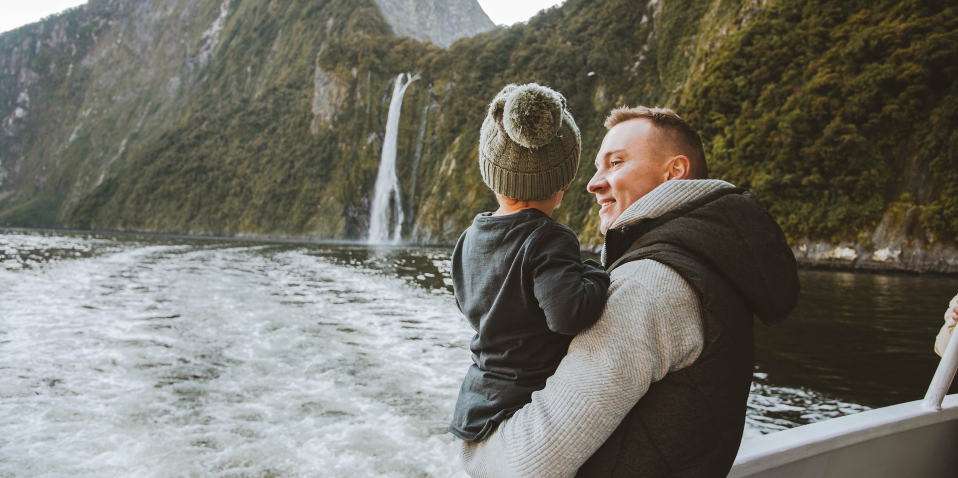 Family admiring the view on the Southern Discoveries Milford Sound