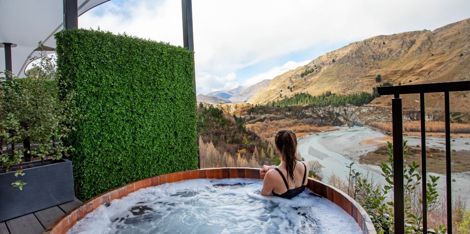 View from the Outdoor Onsen Hot Pools over the Shotover River & Queenstown mountains
